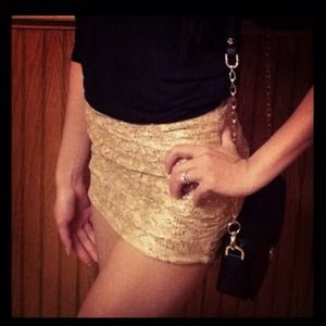 Sequin gold lacy mini skirt. Sequin gold lacy mini skirt.