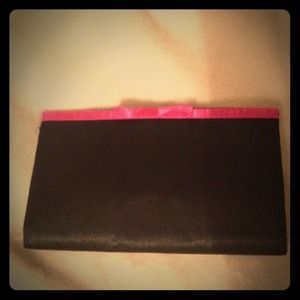 Black clutch with magenta bow ο Black clutch with magenta bow ο