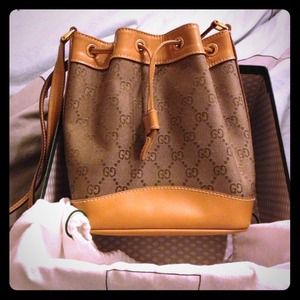 Gucci Handbags - Authentic Gucci small drawstring bag Gucci Handbags - Authentic Gucci small drawstring bag