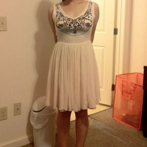 A silk dress with luxury decorative sequins A silk dress with luxury decorative sequins