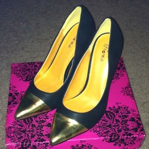 Reduced!!! Black and gold cap toe heels Reduced!!! Black and gold cap toe heels