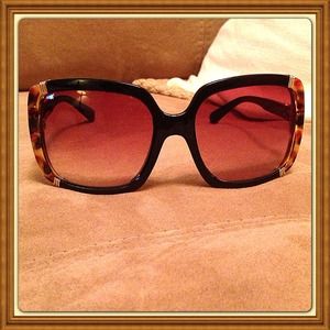 Tortoise and black framed sunglasses Tortoise and black framed sunglasses