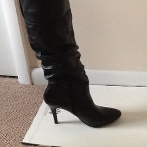 Aldo black leather boots .. Aldo black leather boots ..