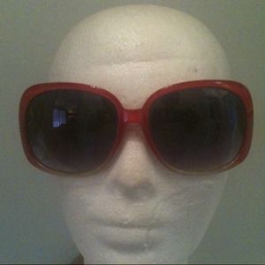 Red sunglasses with heart rhinestones. Red sunglasses with heart rhinestones.