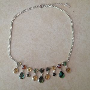 Silver necklace with multicolor stones. Silver necklace with multicolor stones.