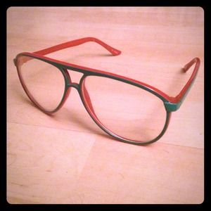Green and orange framed glasses. Green and orange framed glasses.