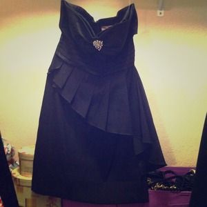 Black cocktail dress by Romeo and Juliet Couture Black cocktail dress by Romeo and Juliet Couture