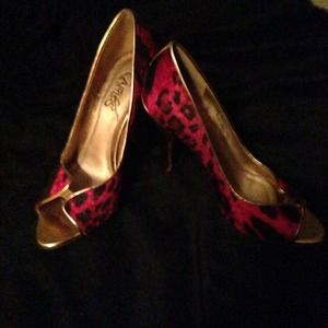 Sexy red/black animal print pony hair peep toes. Sexy red/black animal print pony hair peep toes.