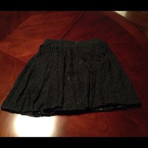 Brand new Black lace skirt with flower detailing. Brand new Black lace skirt with flower detailing.