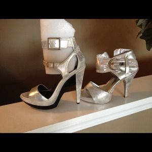 Silver size 8 heels; ankle strap Silver size 8 heels; ankle strap