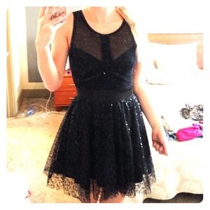 Bebe black sequin cut out dress Bebe black sequin cut out dress