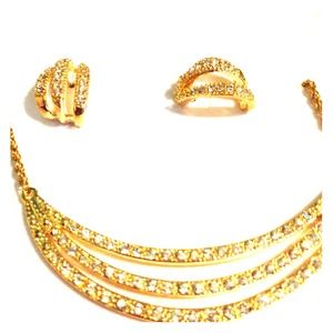 Gold earrings with necklace and rhinestones Gold earrings with necklace and rhinestones