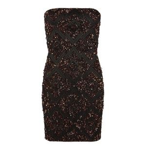 Black tube dress all hand beaded with red and gold Black tube dress all hand beaded with red and gold