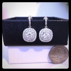  Beautiful halo style CZ diamond earrings Beautiful halo style CZ diamond earrings