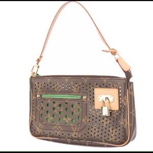 Limited edition perforated pochette Limited edition perforated pochette