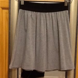 Gray skater skirt with black elastic at waist Gray skater skirt with black elastic at waist