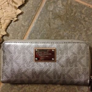 New Michael Kors Silver zip around wallet New Michael Kors Silver zip around wallet