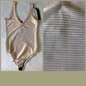 Poof Couture Tops - GOLD RIBBED BODYSUIT Poof Couture Tops - GOLD RIBBED BODYSUIT