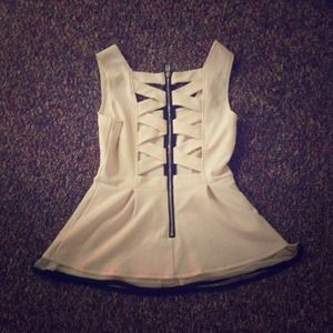 Ivory peplum top with black detailing! Ivory peplum top with black detailing!