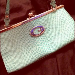 $16 BLACK FRIDAY! GuessTeal Alligator Print Clutch $16 BLACK FRIDAY! GuessTeal Alligator Print Clutch