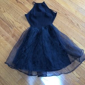 Black party dress. Open back criss cross straps Black party dress. Open back criss cross straps