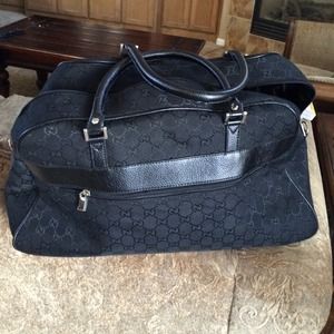Gucci Handbags - đź’ŻAuthentic black Gucci denim carry on. Gucci Handbags - đź’ŻAuthentic black Gucci denim carry on.
