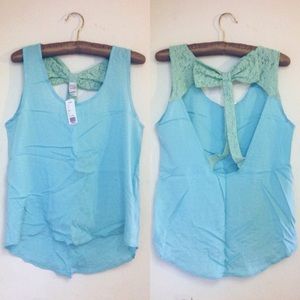 NWT Mint Cut Out Tank Top w/ Lace/Bow Detail NWT Mint Cut Out Tank Top w/ Lace/Bow Detail