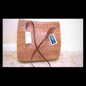 Jennifer Moore straw bag with leather stings. Jennifer Moore straw bag with leather stings.