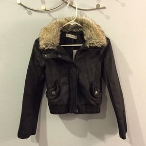 Black leather biker jacket with fur collar Black leather biker jacket with fur collar