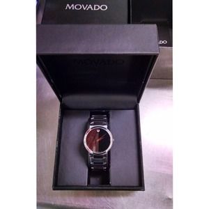 MOVADO STAINLESS STEEL MODEL # 0605903 RETAIL $995 MOVADO STAINLESS STEEL MODEL # 0605903 RETAIL $995