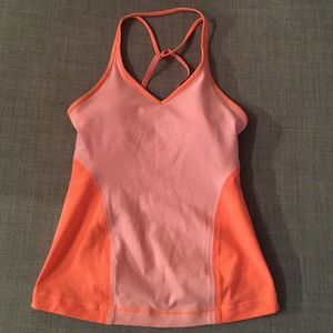 Lululemon workout top with build in bra. Size 2 Lululemon workout top with build in bra. Size 2