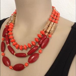 Orange and gold tone statement beaded necklace Orange and gold tone statement beaded necklace