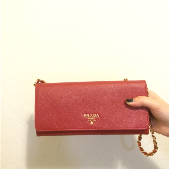 38% off Prada Clutches \u0026amp; Wallets - PRADA CHAIN WALLET IN RED ...  