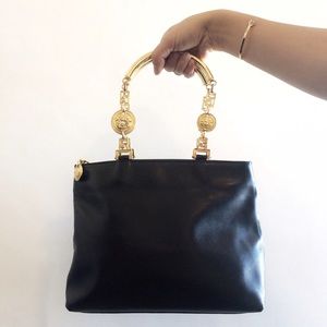 Versace Handbags - Vintage Black Leather Versace Bag w/ Gold Handles Versace Handbags - Vintage Black Leather Versace Bag w/ Gold Handles