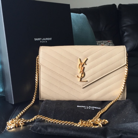 35% off Yves Saint Laurent Handbags - Authentic Cream colored YSL ...  