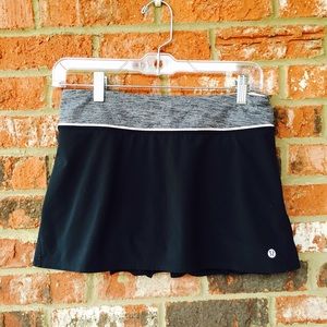 lululemon athletica Dresses & Skirts - LULULEMON black mini skirt with pink/grey trimming lululemon athletica Dresses & Skirts - LULULEMON black mini skirt with pink/grey trimming