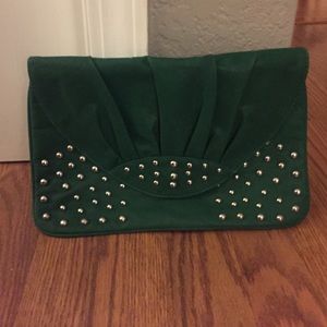 Green stud envelope clutch. Green stud envelope clutch.