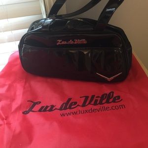 Lux de Ville black Cruiser tote. Lux de Ville black Cruiser tote.