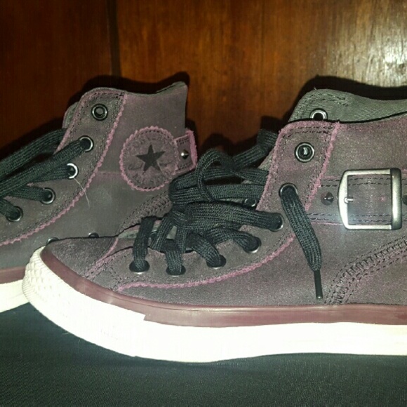 33% off Converse Shoes - Converse Purple Leather Hightop from Bella's closet on Poshmark