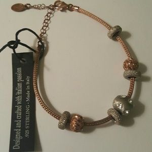 Dyadema Jewelry - Rosegold and sterling silver bracelet Dyadema Jewelry - Rosegold and sterling silver bracelet