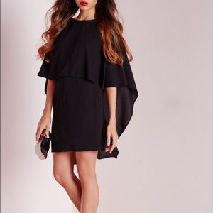 Missguided Dresses & Skirts - New WITH tags. Beautiful black cape dress Missguided Dresses & Skirts - New WITH tags. Beautiful black cape dress