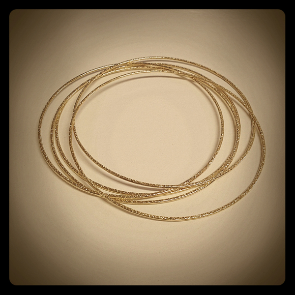 Gold hammered bangles