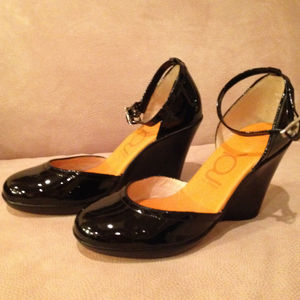 You by Crocs black pat leather never worn. 6.5