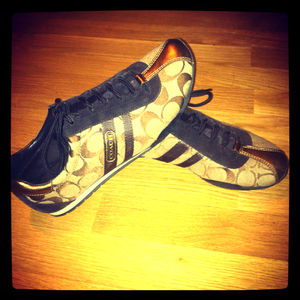 Sneakers by Coach.