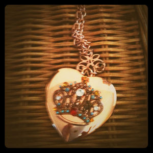Heart shaped necklace with a crown