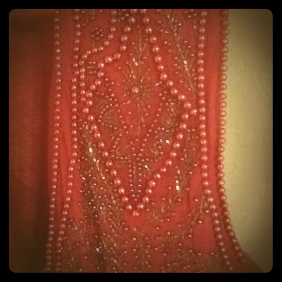 It's about the detail, beaded vest
