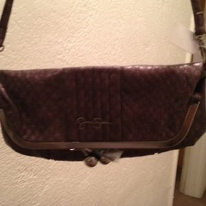 Jessica Simpson purple leather purse.