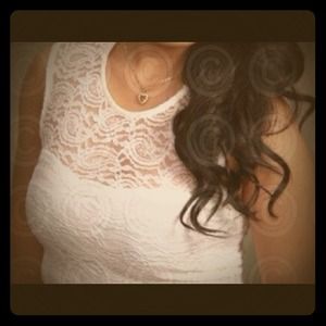 White, fitted lace dress.