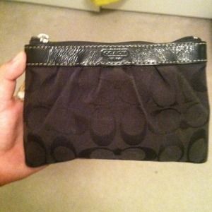 Coach wristlet little wear and tear!