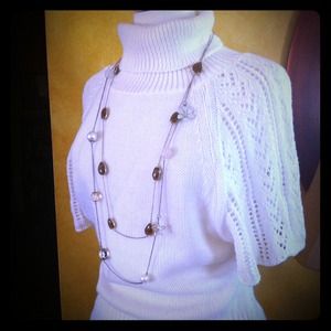 Lightweight cream sweater.